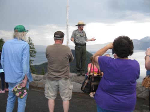 Pictured: Brian Ettling, park ranger, teaches visitors about National Parks. 