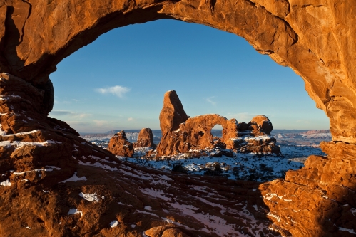 Turret Arch and North Window are two of the massive stone arches at the Windows Section in Arches National Park. Photo Credit: NPS/Jacob W. Frank.