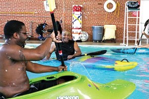 Learning the basics of kayaking in the medical center's swimming pool at Jefferson Barracks. Photo Credit: Ursula Ruhl, Webster-Kirkwood Times.